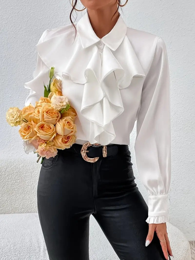 Stylish shirt with ruffled and layered design details.