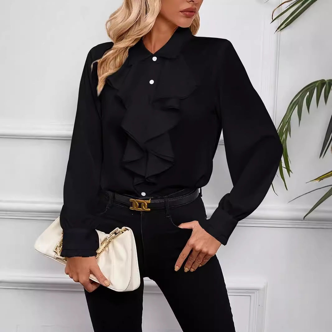 Stylish shirt with ruffled and layered design details.