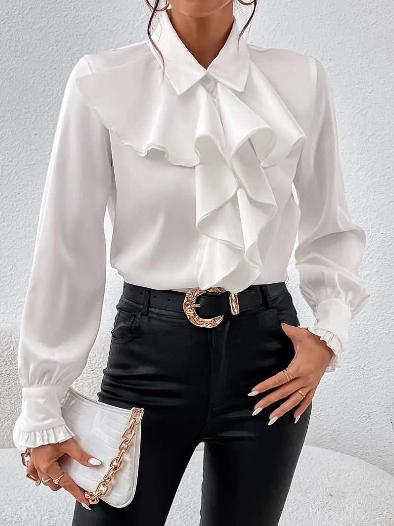 Stylish shirt with ruffled and layered design details.